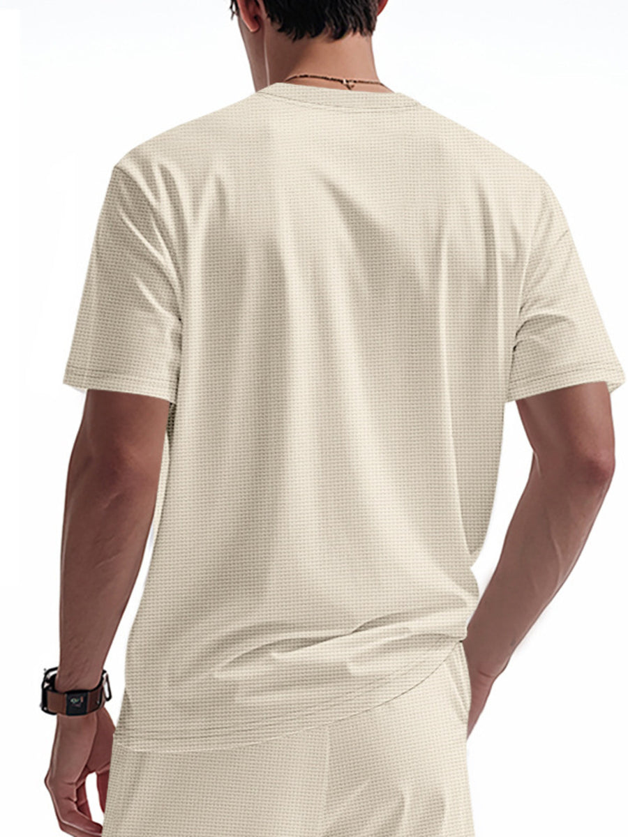 Apricot cotton t-shirt with waffle texture, short sleeves and crew neck.