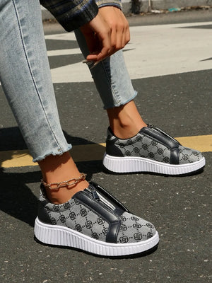 Logo print zip-up platform sneakers in gray with white soles and black trim.
