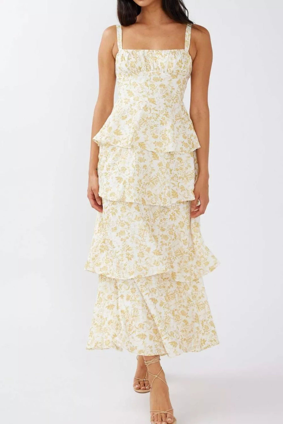 Tiered maxi dress with square neckline, floral print, and peplum detail