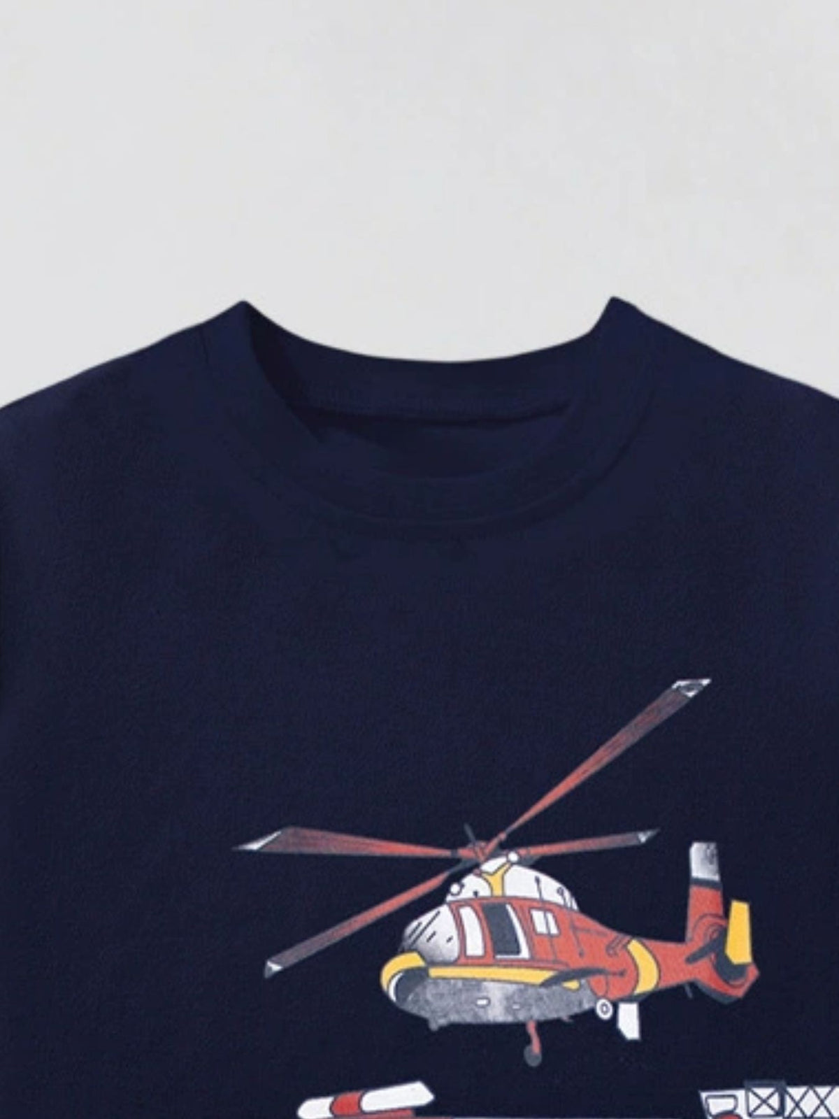Navy cotton blend crew neck t-shirt with a red and yellow helicopter graphic.
