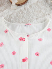 White ribbed knit pajama top with pink floral print and button front