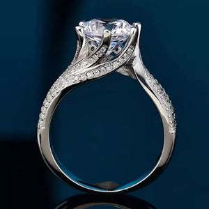 Exquisite 5ct Moissanite solitaire ring in silver with pave diamond band.