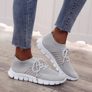 Pink athletic shoes with not applicable and lace-up