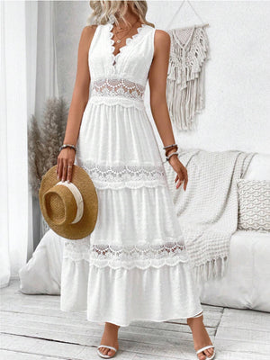 White lace trim Swiss dot maxi dress with tiered skirt and V-neck.
