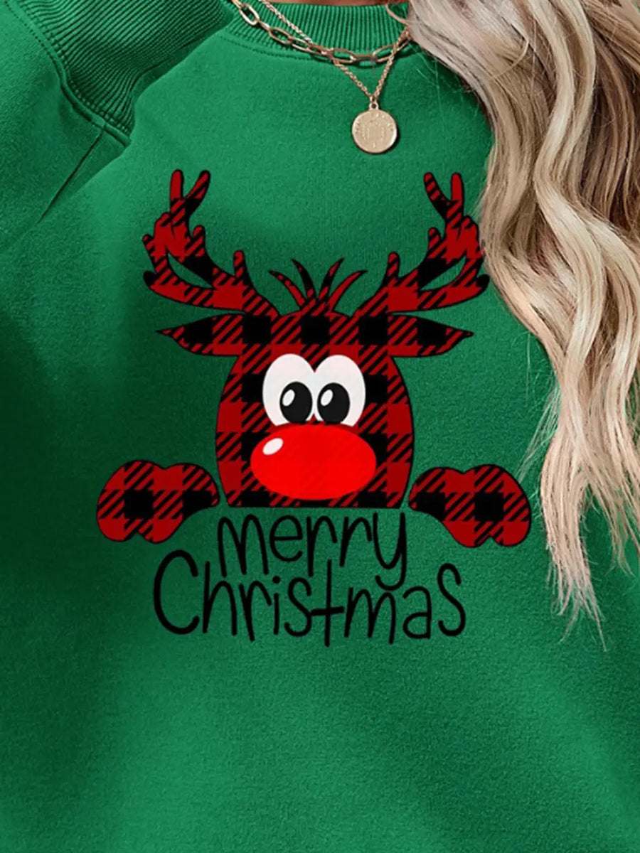Green crewneck sweatshirt with plaid reindeer graphic and Merry Christmas text.