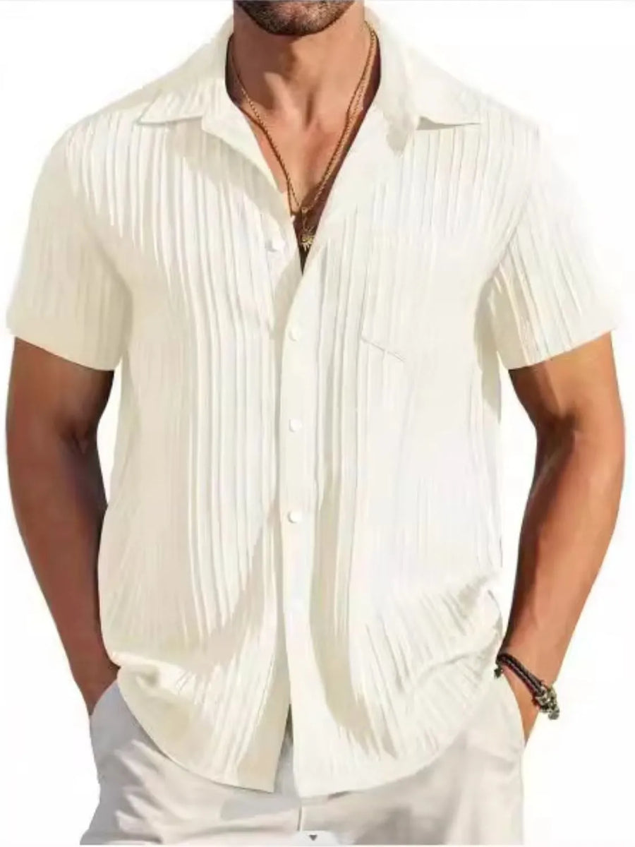 Ivory textured pleated resort shirt with short sleeves and a button-down front.