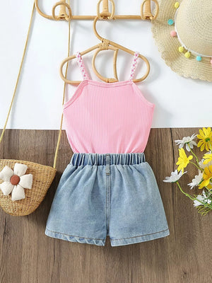 Pink ribbed cami with floral straps and denim shorts set for toddlers.