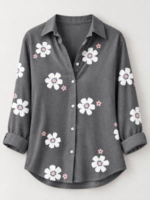 95% or more polyester button-down shirt in pink with relaxed silhouette