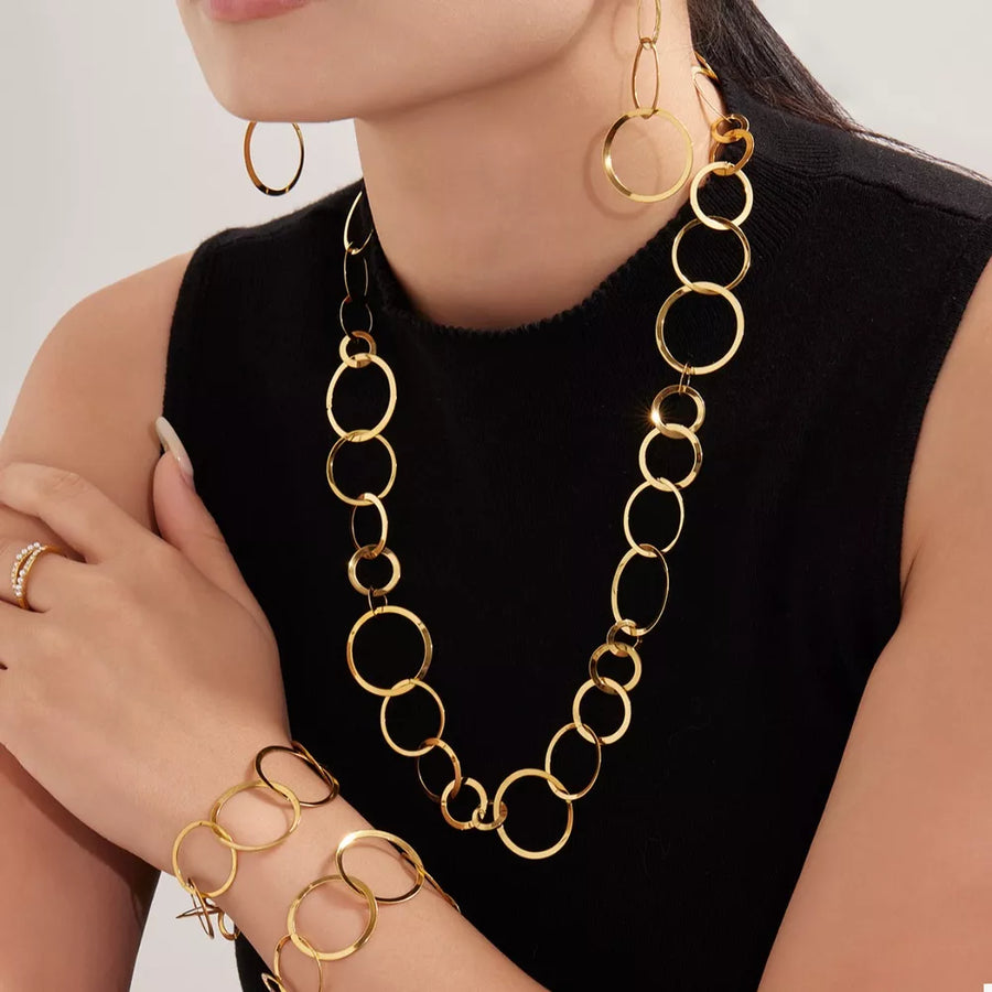 gold necklace with hip-length and clasp