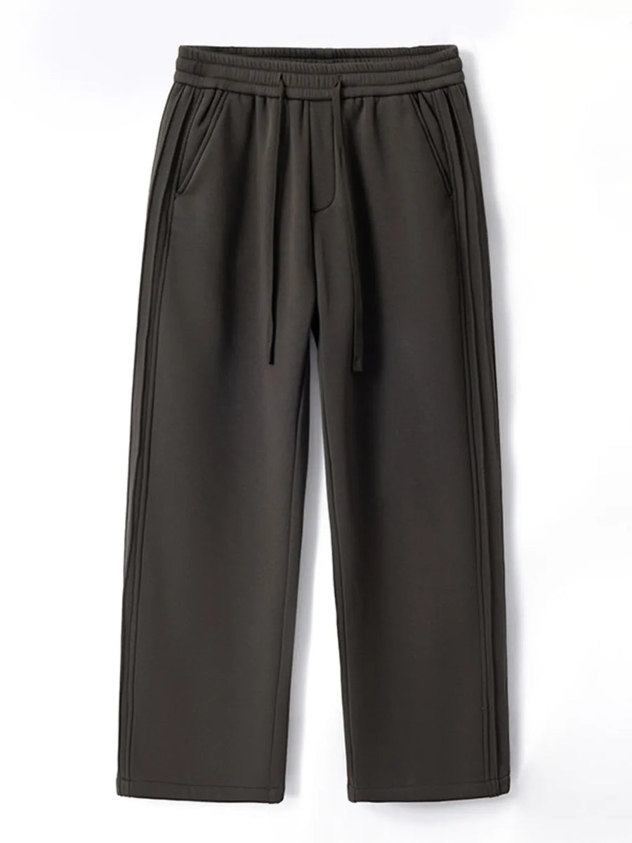 Men's dark gray relaxed fit sweatpants with drawstring and side seam detail.