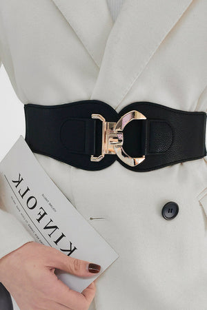 Black elasticated corset belt with sculpted gold-tone buckle detail.