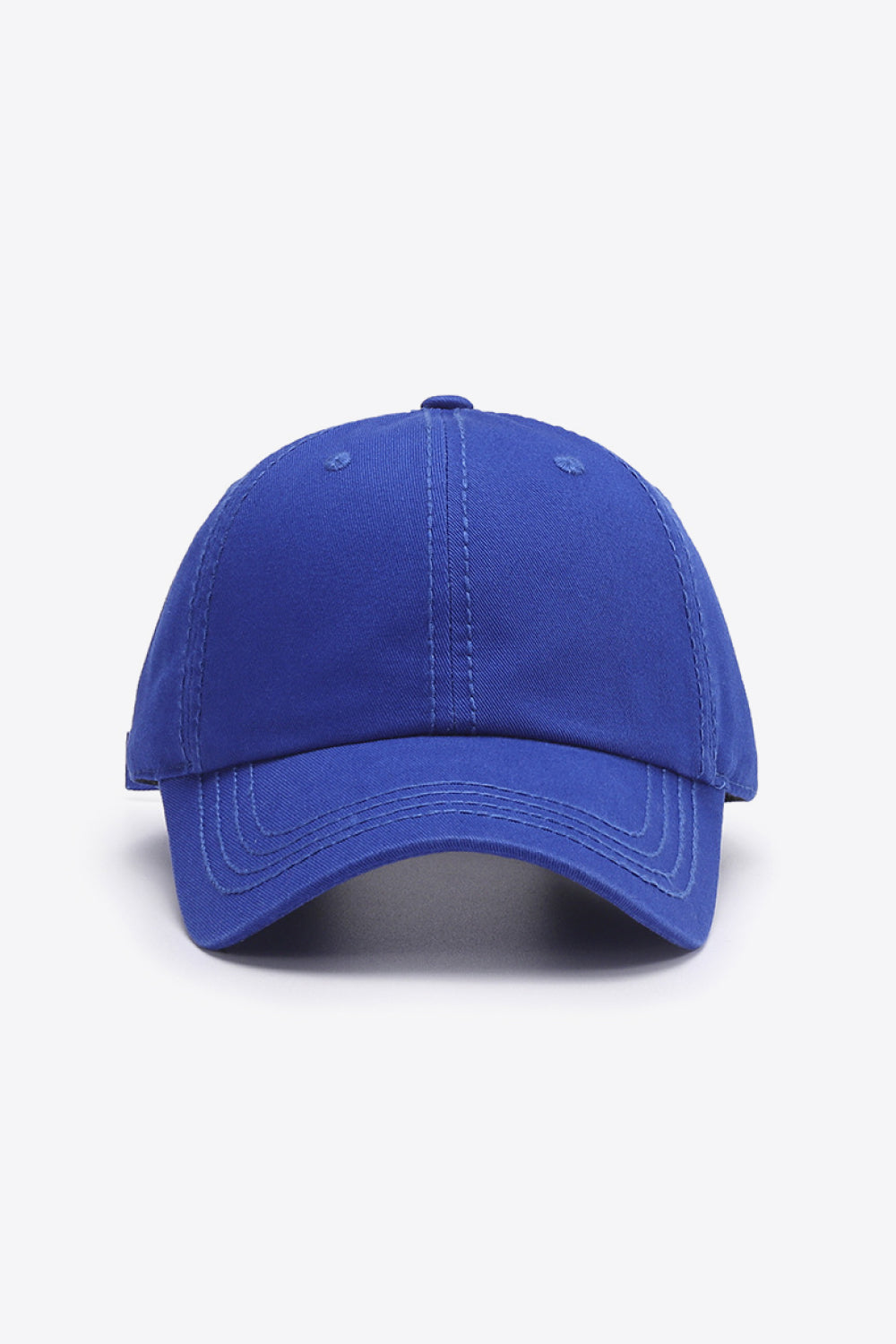 Cobalt canvas baseball cap with stitched details and curved brim.