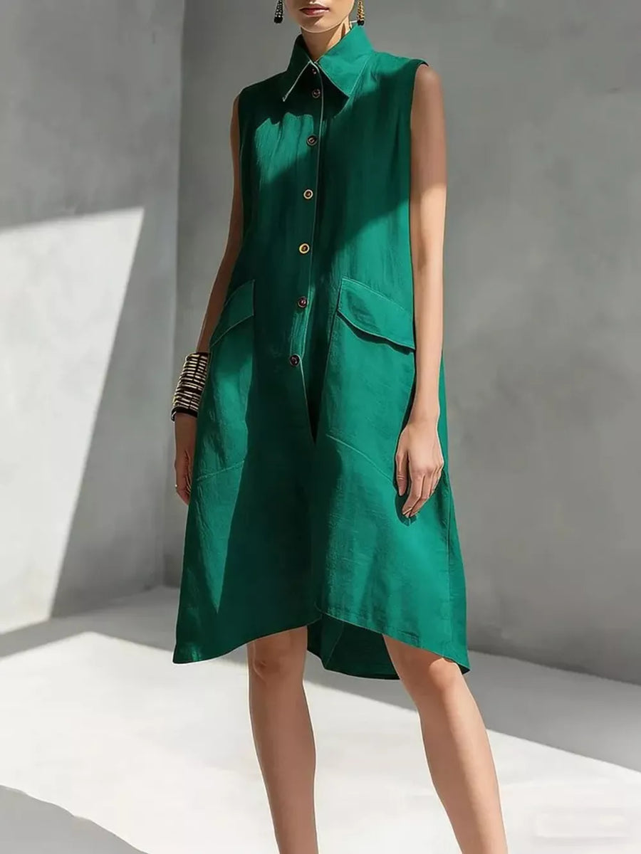 Sleeveless green linen shirt dress with button front and flap pockets