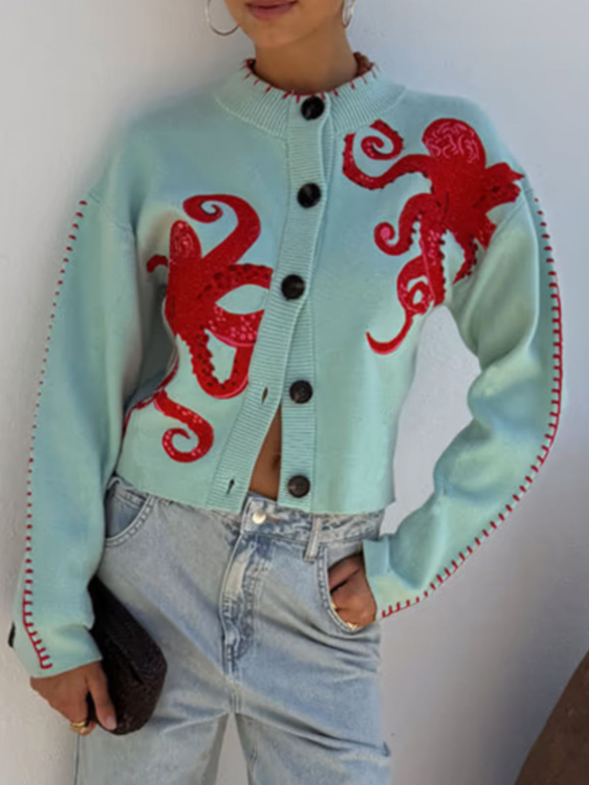 mint green cardigan with octopus graphic and mock neck