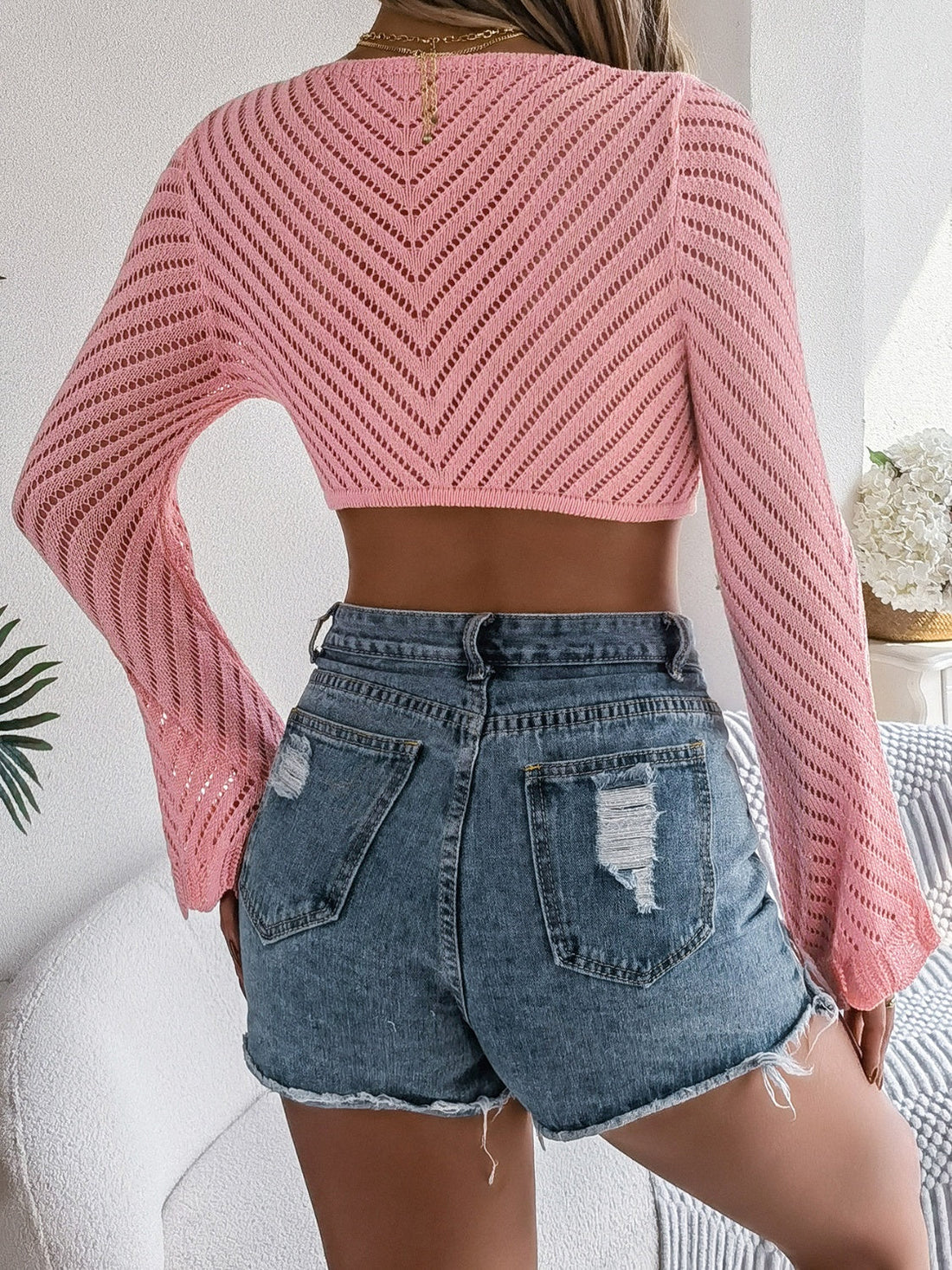 Pink crochet tie-front bell sleeve crop top with chevron pattern