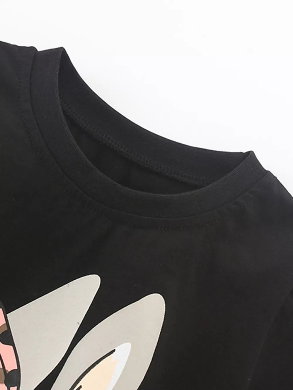 Black toddler t-shirt with a playful bunny graphic and crew neck.