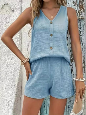 Sky blue V-neck tank top with button detail and matching textured shorts.