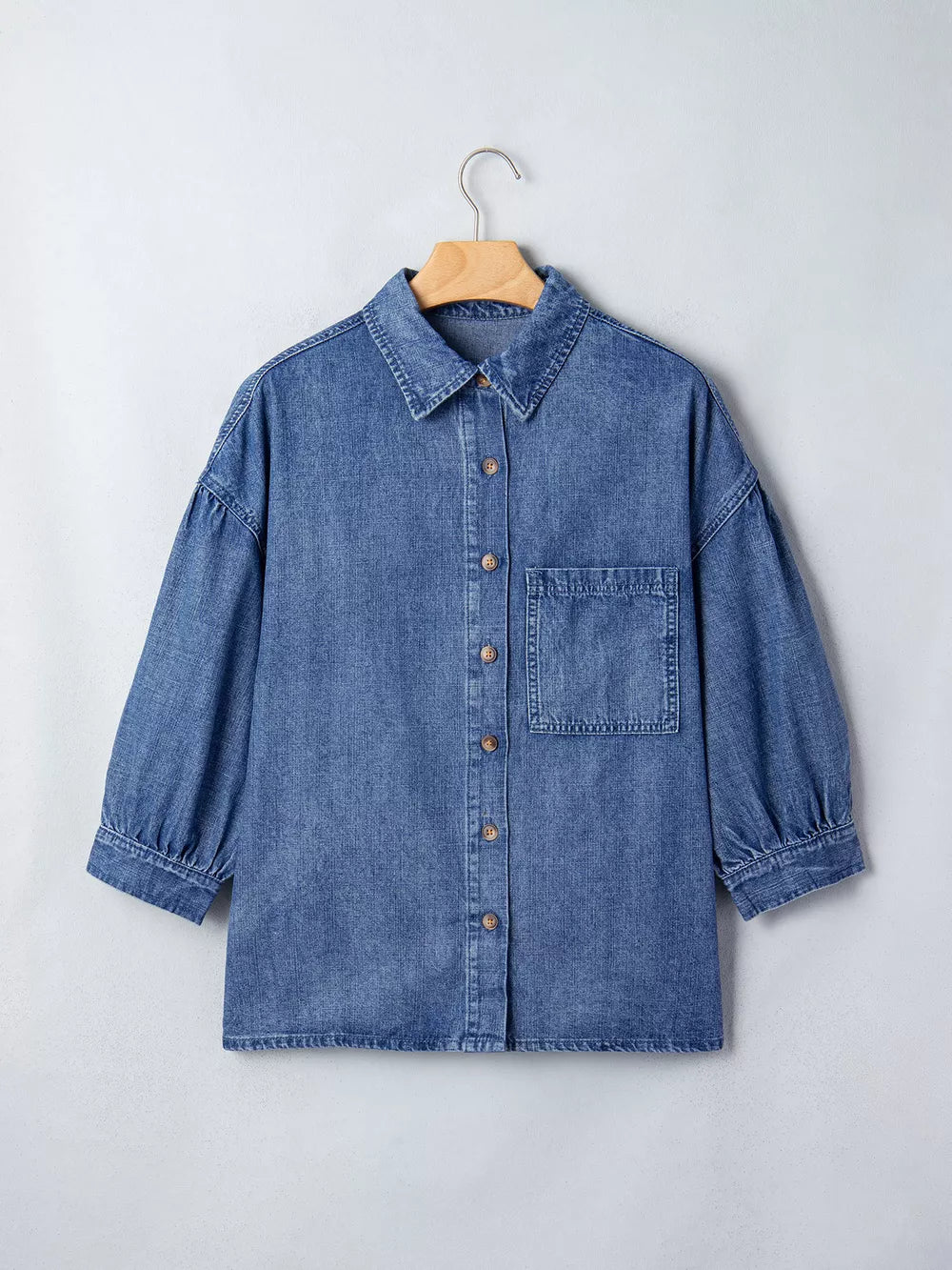 Dusty Blue button-up shirt with hip-length and button-front
