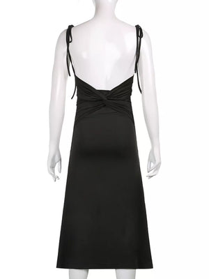 Black ruched midi dress with tie straps and a knotted back detail.