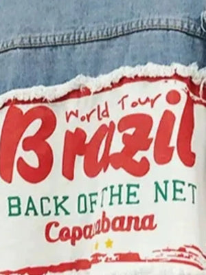 Denim trucker jacket with distressed details and a "Brazil World Tour" graphic patch.