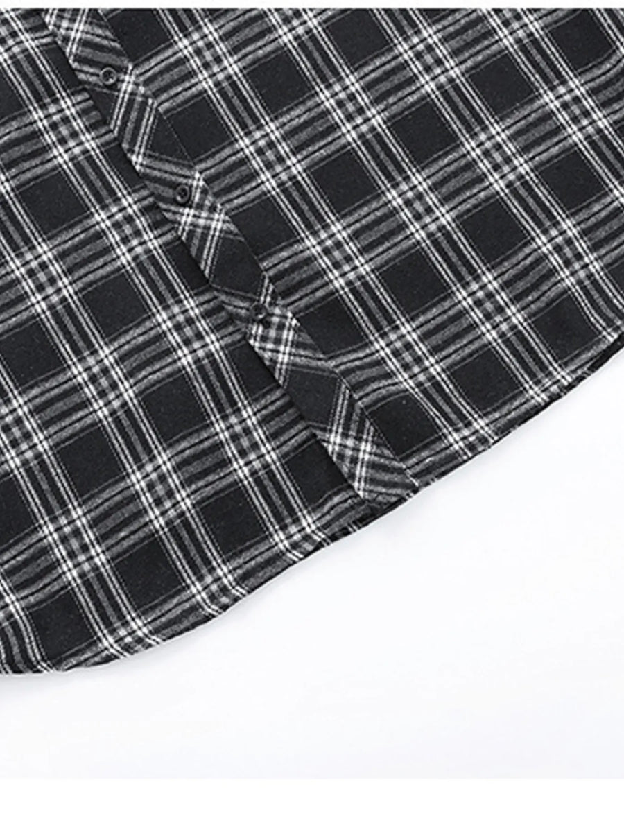 Men's black plaid button-up shirt with cotton blend fabric and classic silhouette.