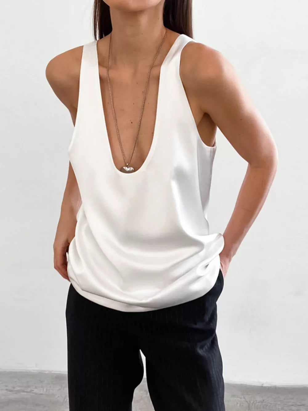 tank top in white featuring stretch and relaxed fit