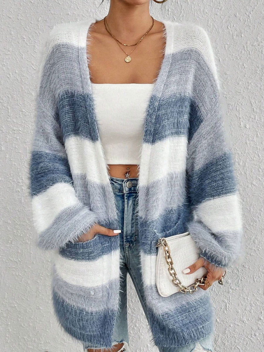 cardigan in white featuring pocketed and oversized fit