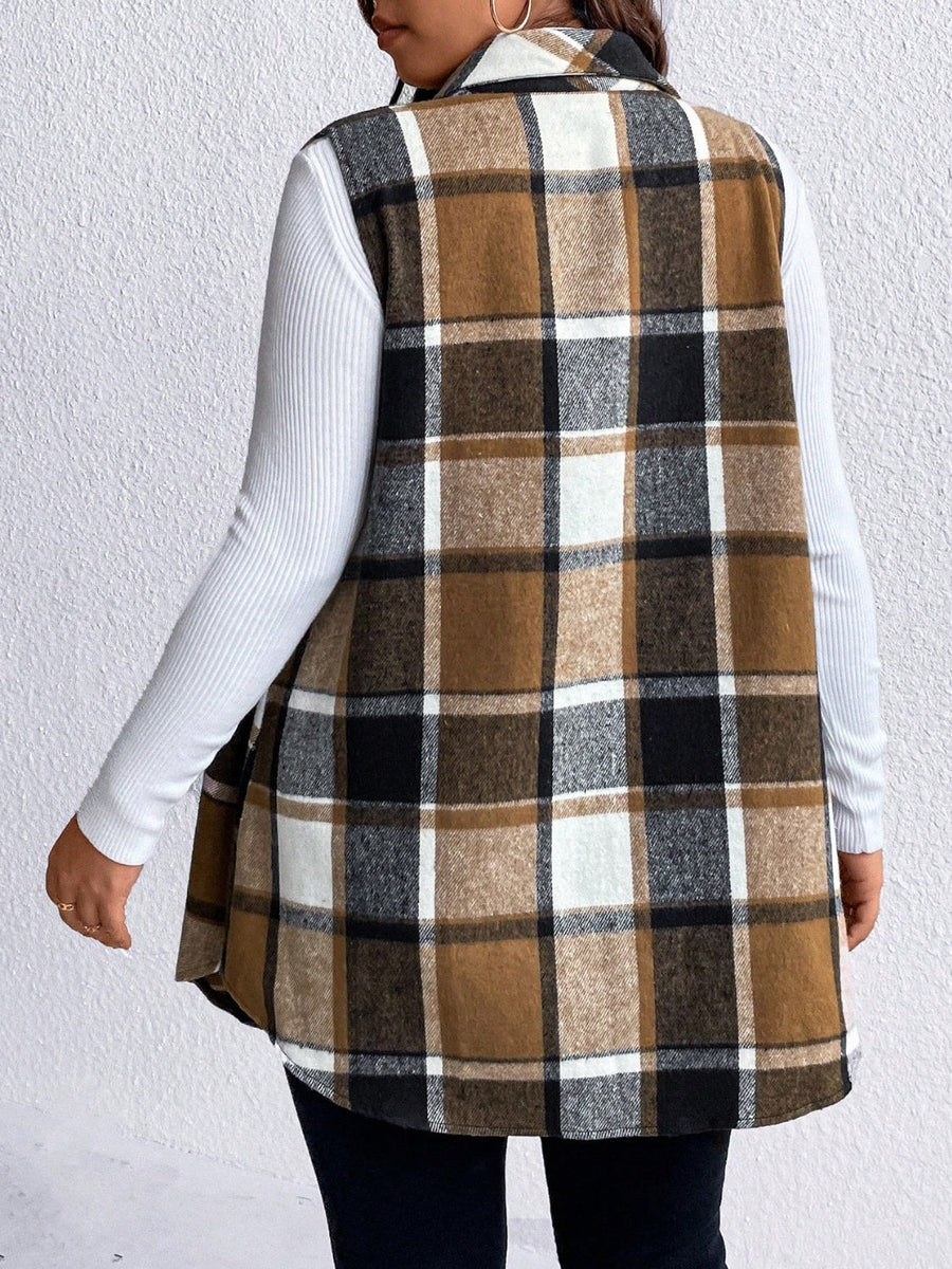 Oversized plaid shirt vest in brown, black, and white, with a collared neckline and buttoned front.