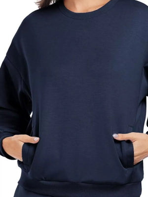 Dark Blue crewneck sweatshirt with front pockets and ribbed cuffs.