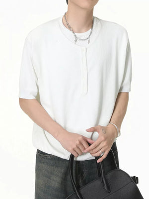 White short sleeve henley t-shirt with button placket and crew neck.
