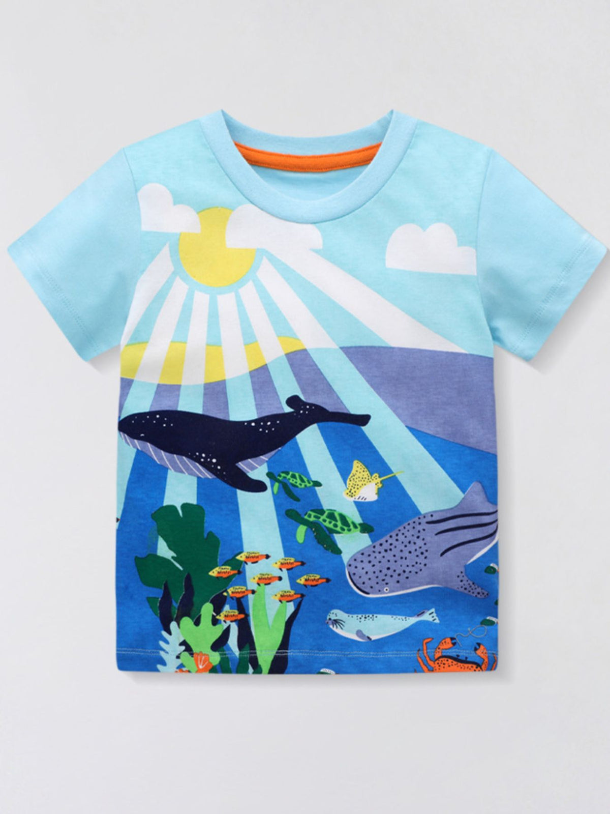 Pastel blue crew neck t-shirt with an underwater adventure graphic featuring whales, turtles, fish, and a crab.