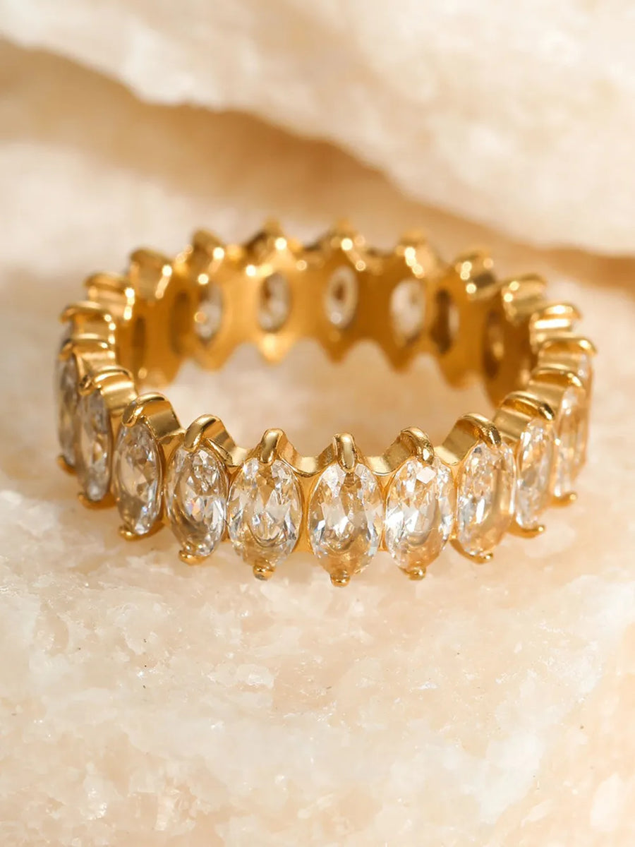 18K Gold-Plated, Stainless Steel, Zircon Care instructions: Avoid wearing during ring in clear with band silhouette