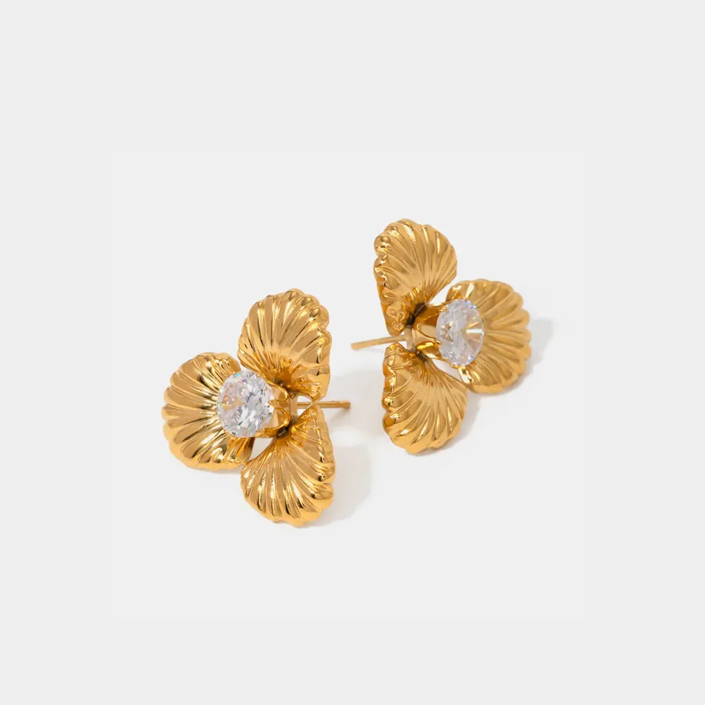 Gold petal stud earrings with clear crystal accents
