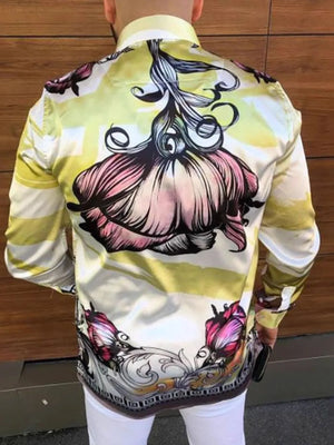 Artistic panel silk shirt in light yellow with bold floral print and striped accents.