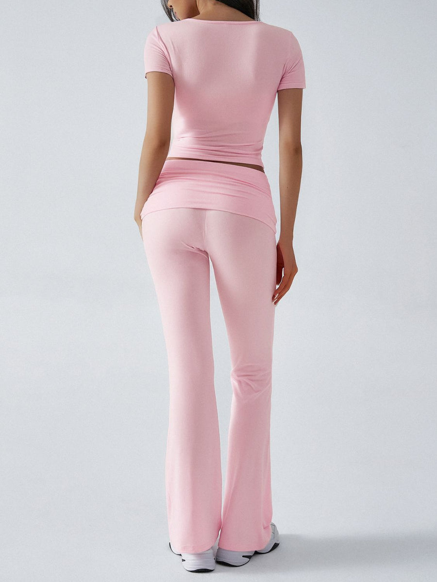 Blush pink loungewear set with ruched waistband and flared pants.