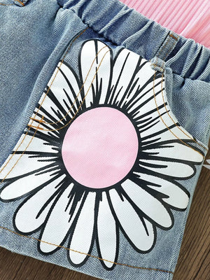 Toddler denim shorts with pink floral applique and pink ribbed cami detail.