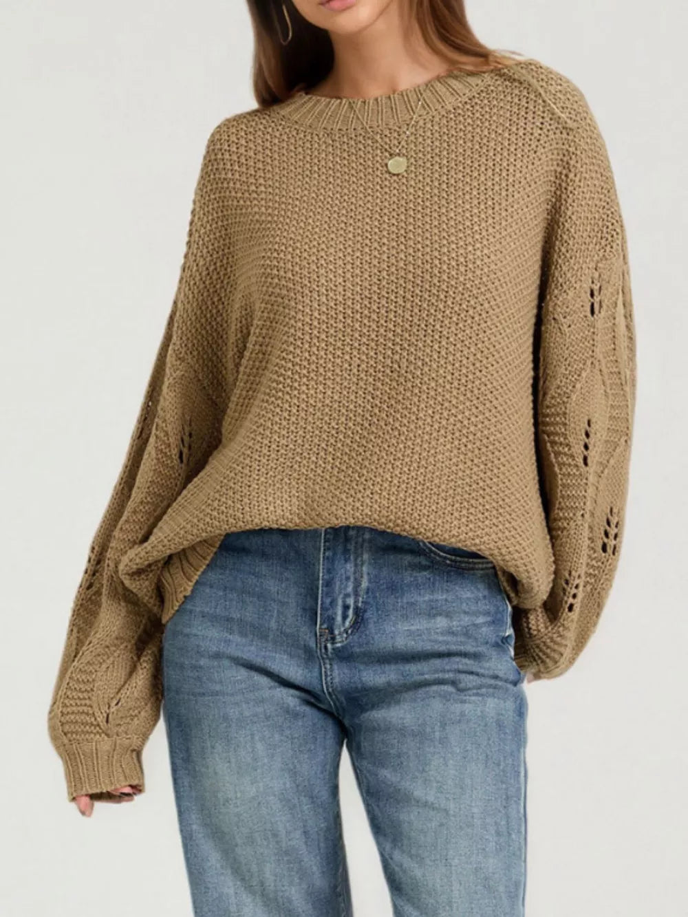 100% polyester Care instructions: Machine wash cold pullover sweater in Red with oversized silhouette