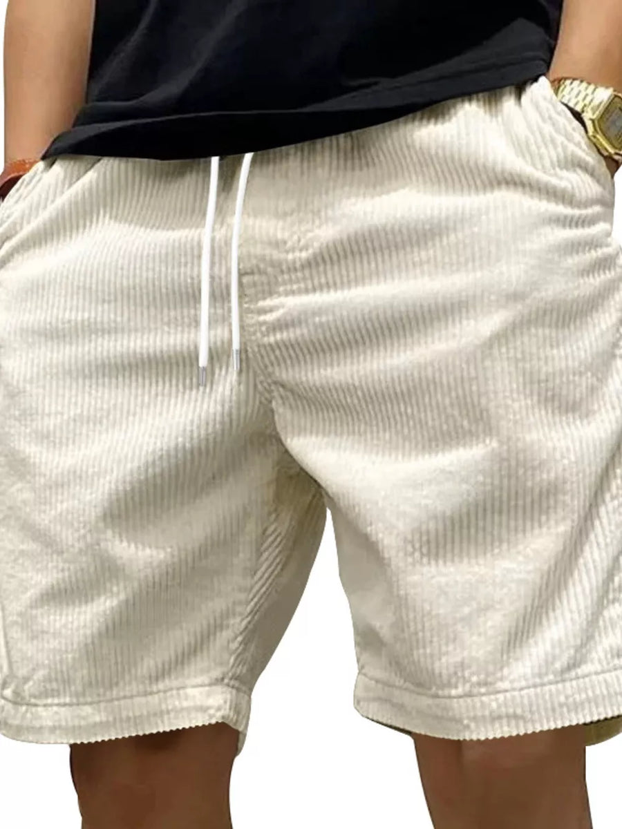 Men's white corduroy chino shorts with drawstring and pockets.