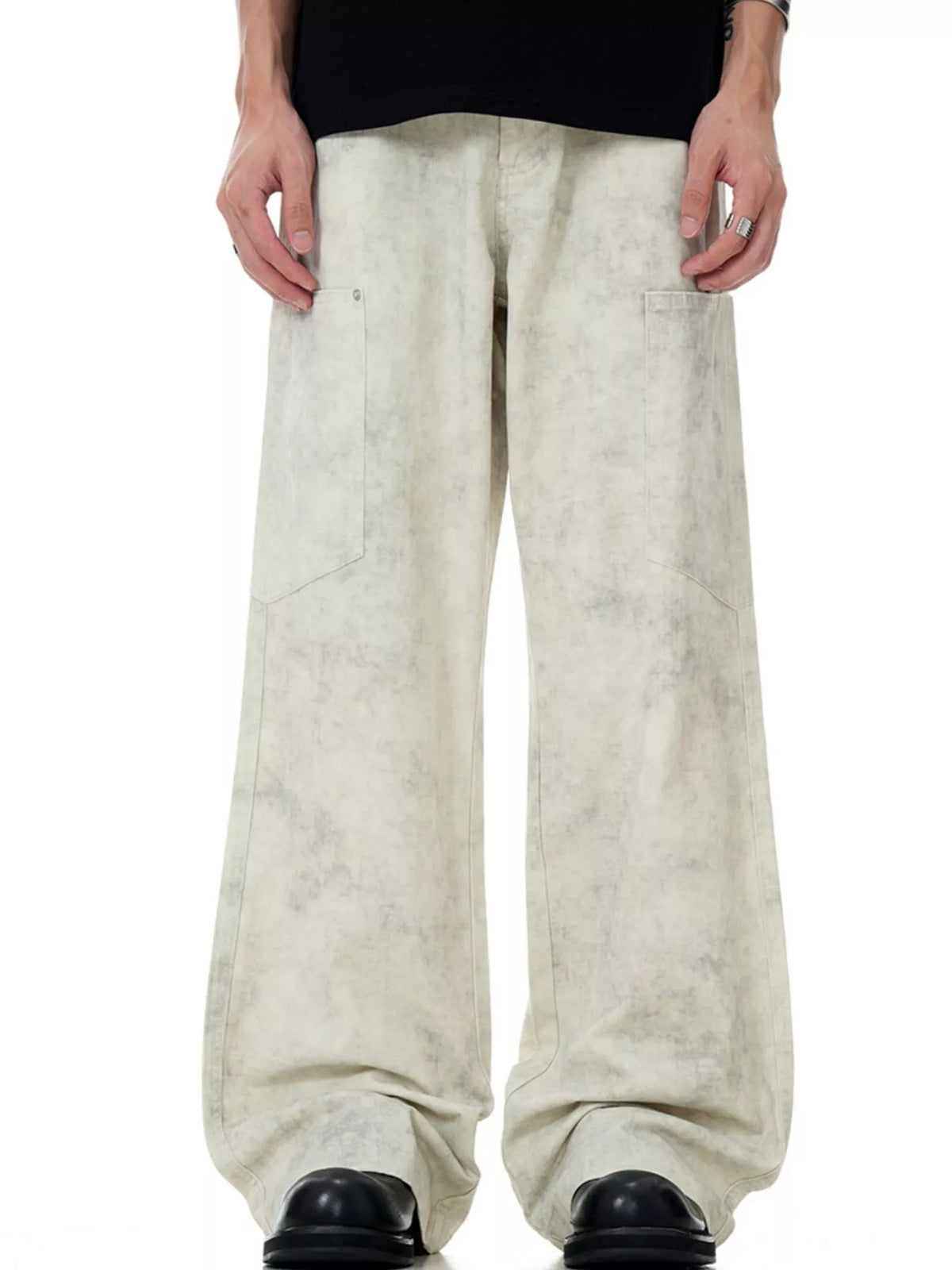 Men's wide-leg pants in marble wheat with a stone-washed pattern and relaxed fit.