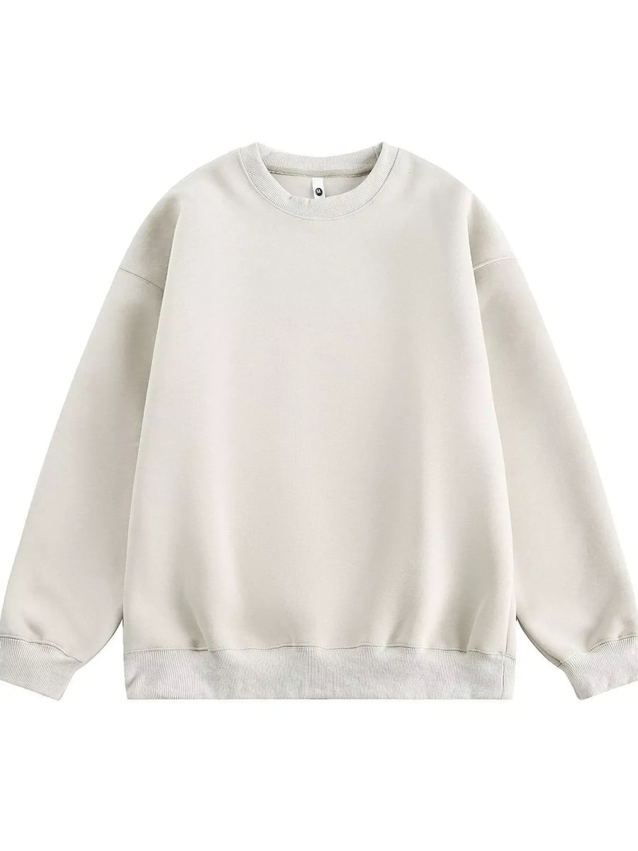 Oversized crew-neck sweatshirt in off-white with ribbed cuffs and hem.