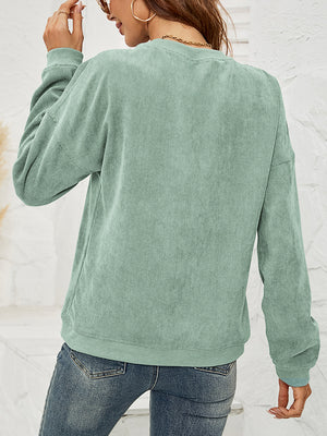 Corduroy sweatshirt in Gum Leaf green with long sleeves and crew neck.