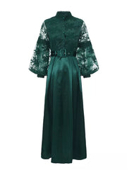 Green lace-embellished maxi dress with lantern sleeves and button-down front.