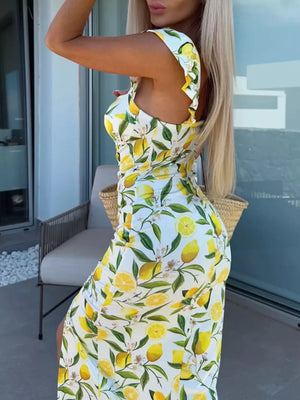 Lemon floral sweetheart midi dress with ruffled cap sleeves and a side slit.