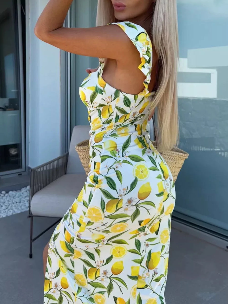 Lemon floral sweetheart midi dress with ruffled cap sleeves and a side slit.