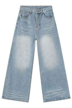 Baggy light blue denim palazzo jeans with a faded wash and wide leg.