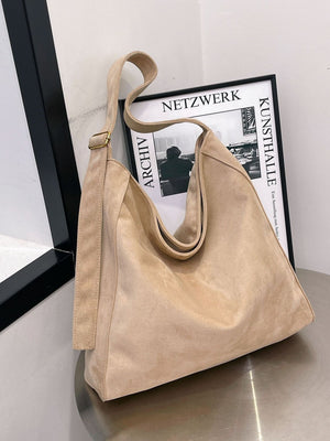 crossbody bag in Black with adjustable straps and large