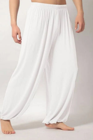 White relaxed drape harem pants with elastic waistband and cuffed ankles.