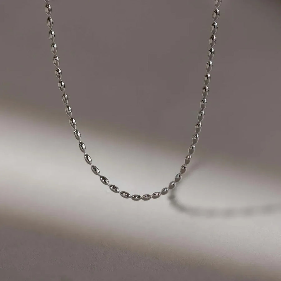Silver capsule chain necklace with oval beads