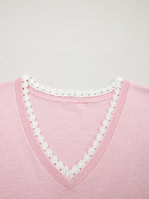 Pink knit v-neck top with white lace trim detail