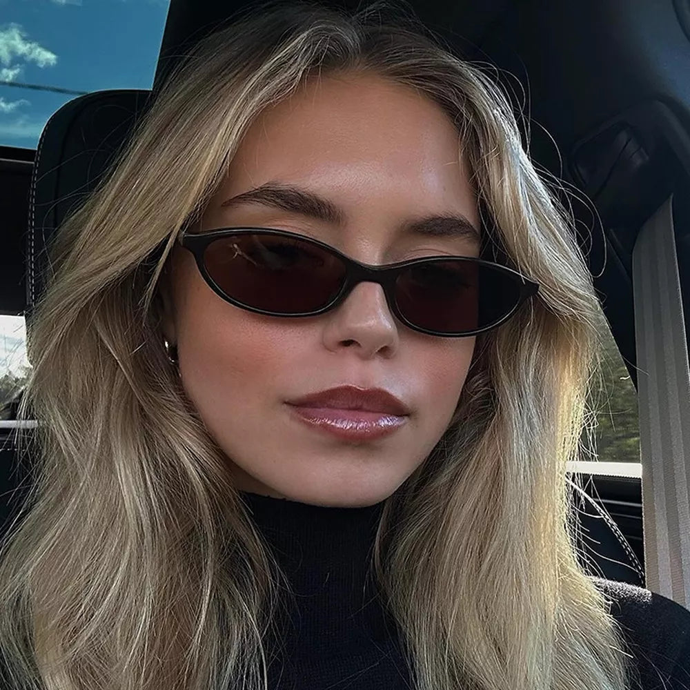 sunglasses in black featuring UV400 protection and oval fit